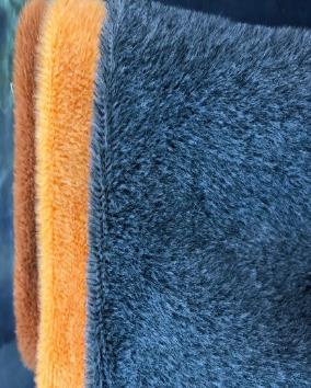 Macro view of fleece fabric showing the bonded surface
